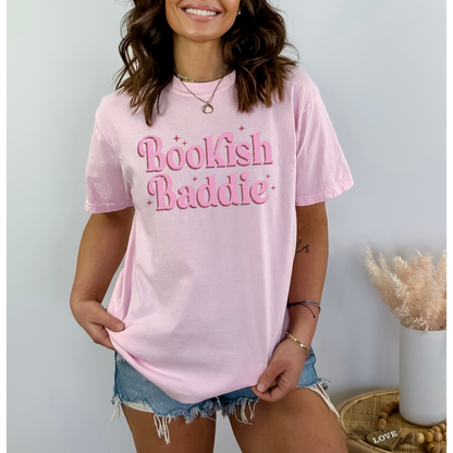 "Bookish Baddie" is more than just a slogan – it's a declaration of your literary prowess and a celebration of your inner baddie. This tee lets you embrace your love for reading while showing off your confident, empowering side.